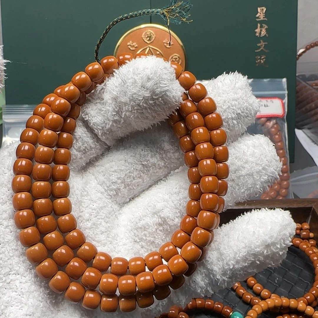 吊坠橄榄核7.3mm老挝三花核尖长串毕业级无白