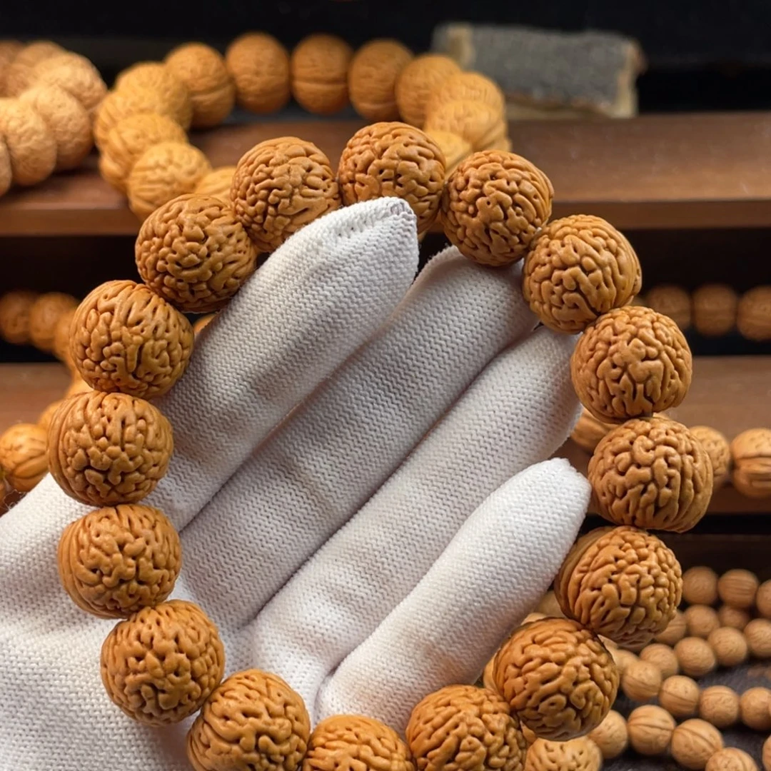 拓***者吊坠桃核野生盘龙