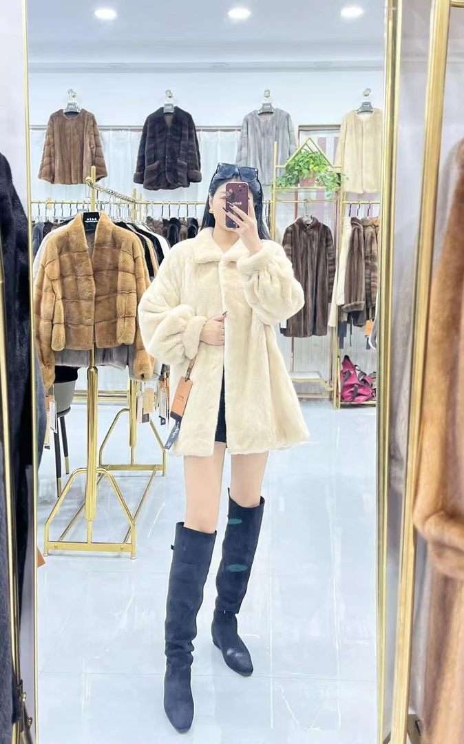 058671【圣世皇妃】中款后摆带浪时尚貂皮大衣