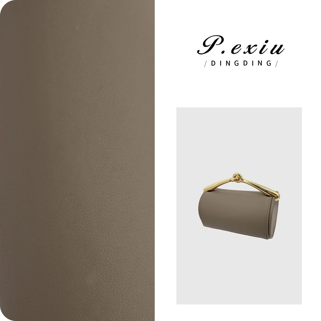 PanYiXiu/潘依绣【大象灰】头层小牛皮磁性翻盖单肩圆筒包BL5933