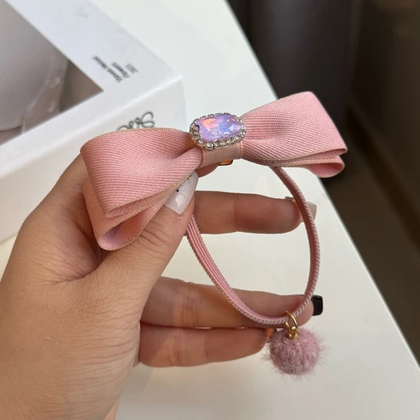 7714粉色简约小蝴蝶结皮筋