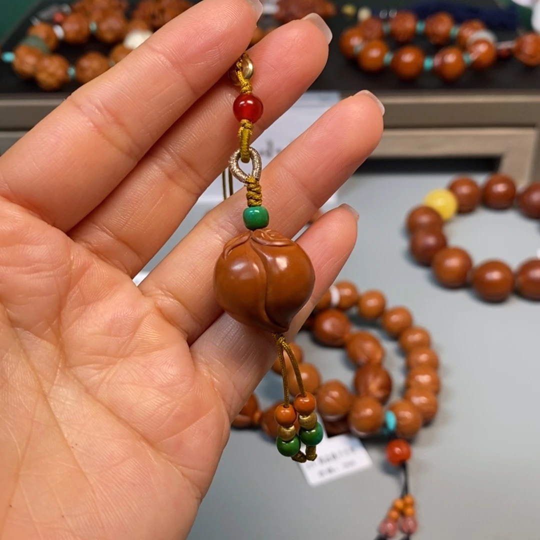 橄榄核手串/手链桃子手机挂件