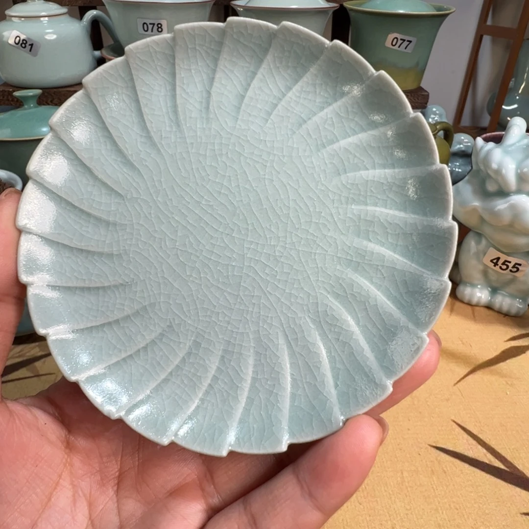 陶精品卵青杯垫。