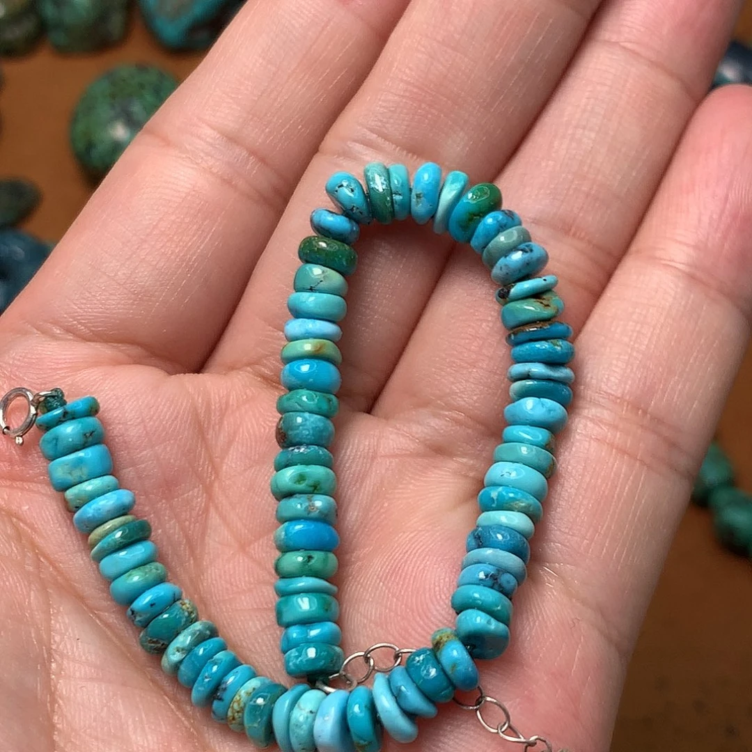 黎***谱绿松石未镶嵌挂件