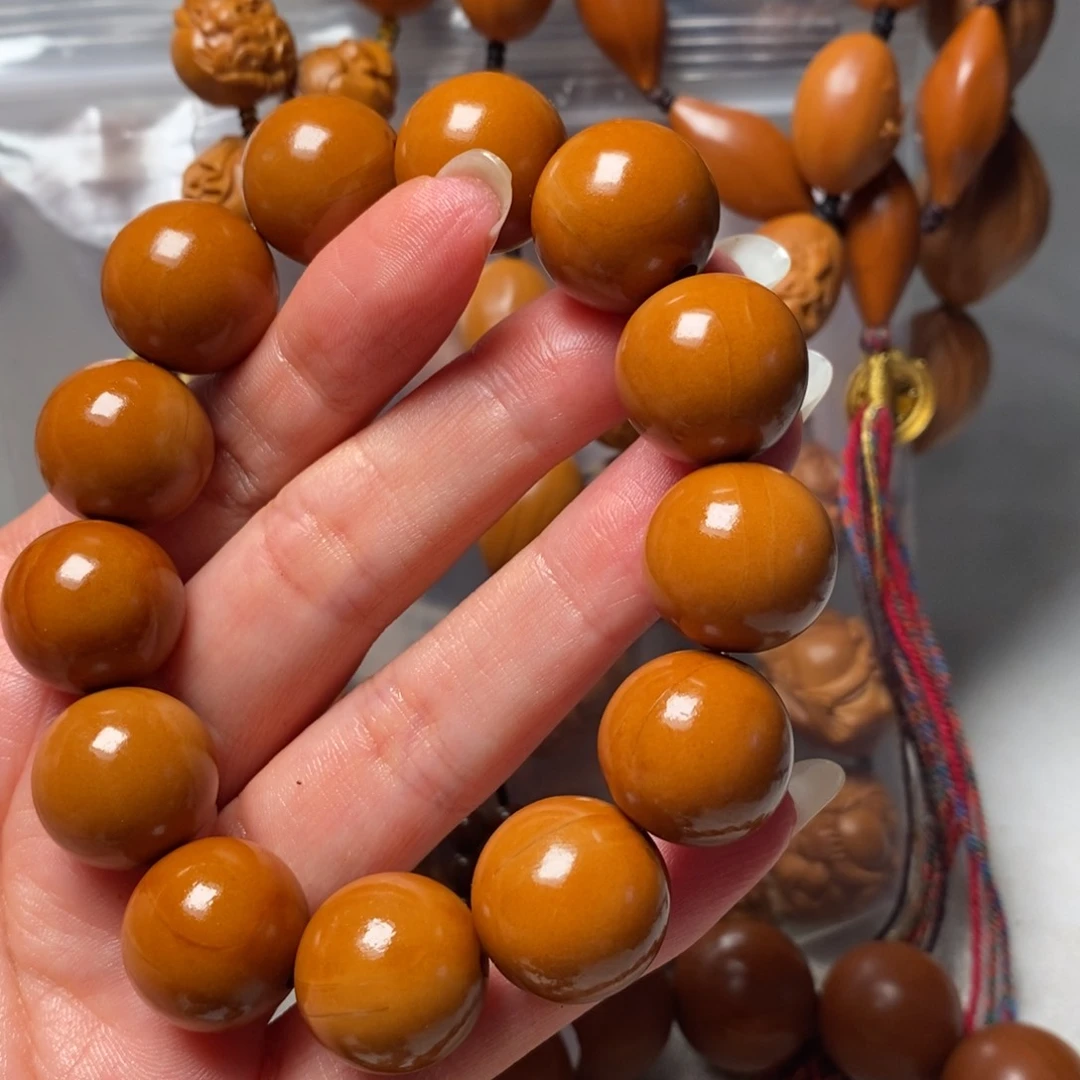 釿***戈橄榄核手串/手链正圆光珠