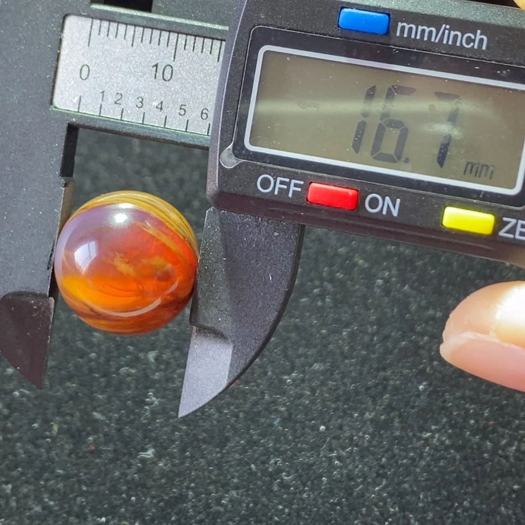 琥珀裸石未镶嵌渔****主特色溶洞16.7 m m打1.5孔