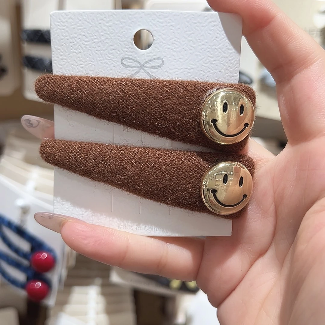非金属仿珍珠笑脸咖色拜拜夹