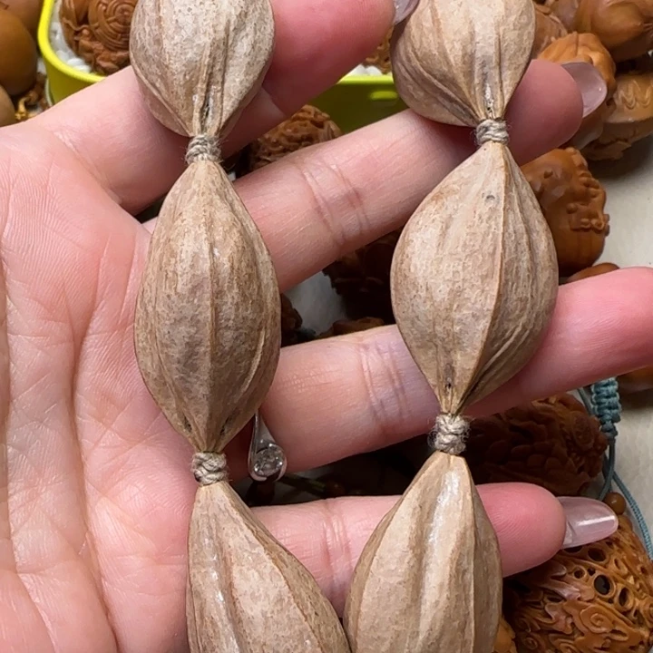 橄榄核吊坠2.2四花素核苏州