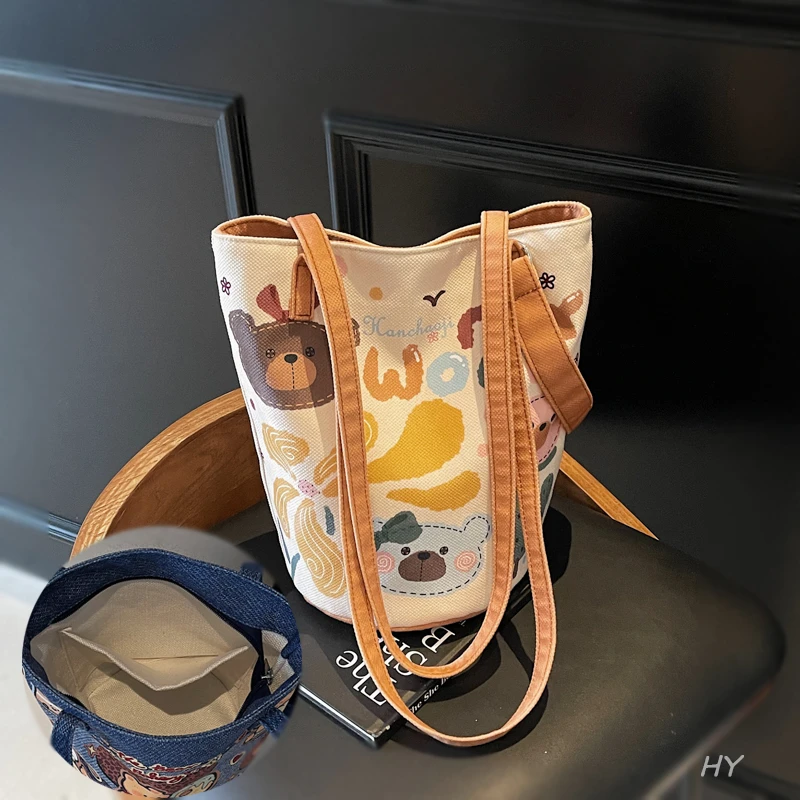 夏季大容量水桶包包女可爱卡通帆布通勤包小众单肩斜挎腋下托特包