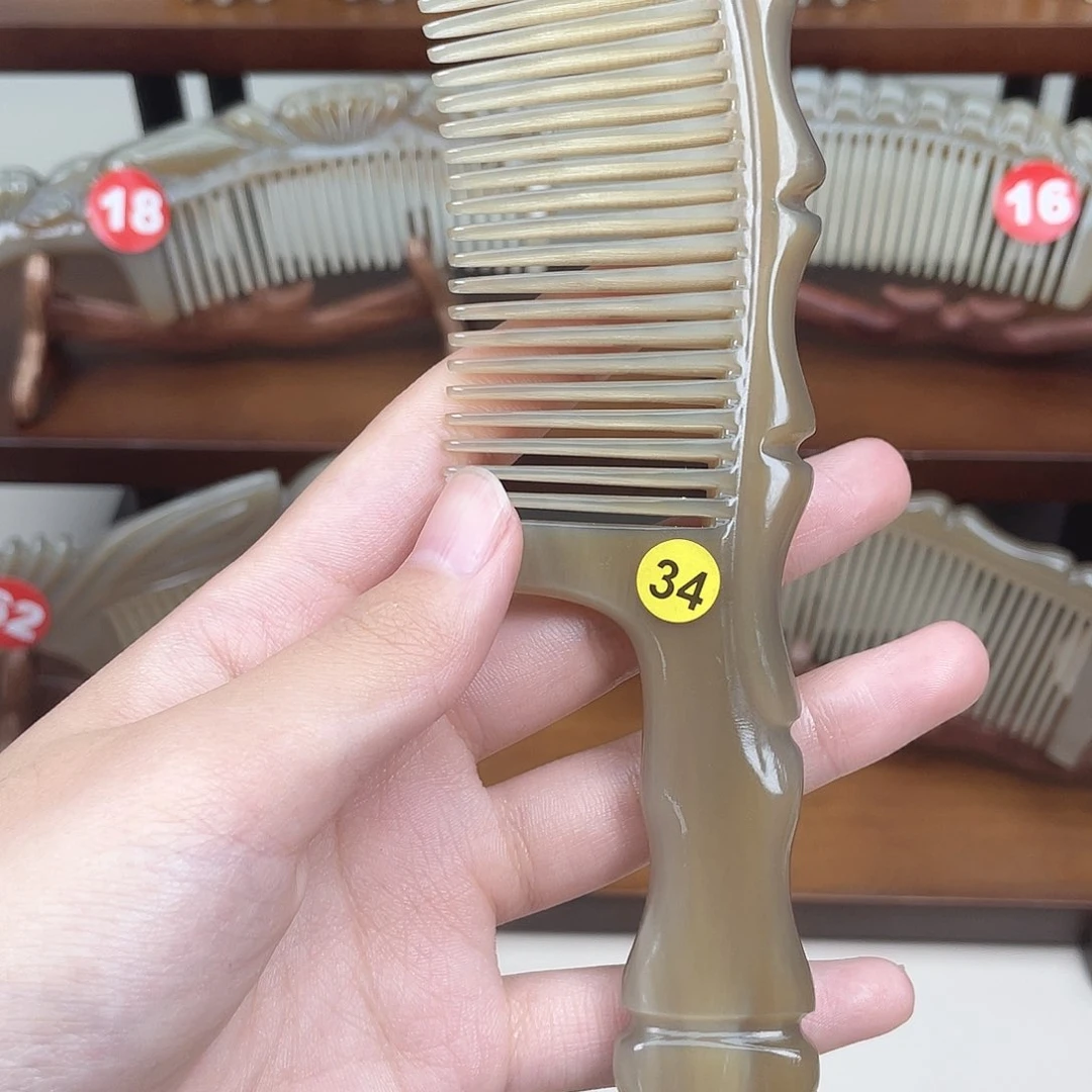 纯手工制作的牛角梳34幸*草