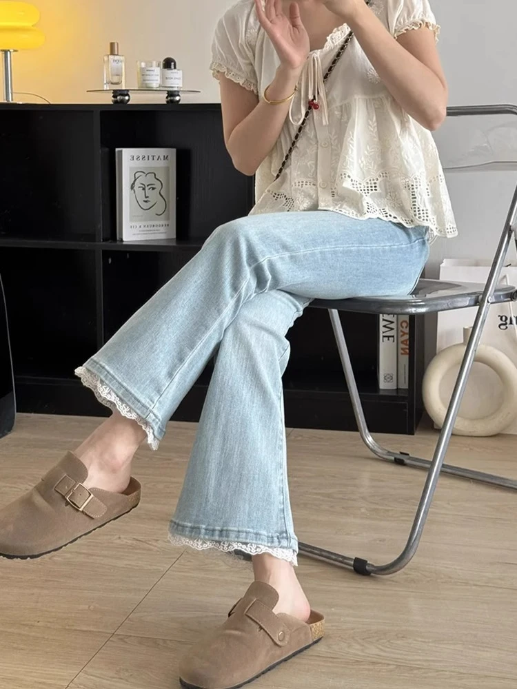 浅蓝色蕾丝九分牛仔裤女春夏新款大码梨形身材显瘦弹力直筒喇叭裤