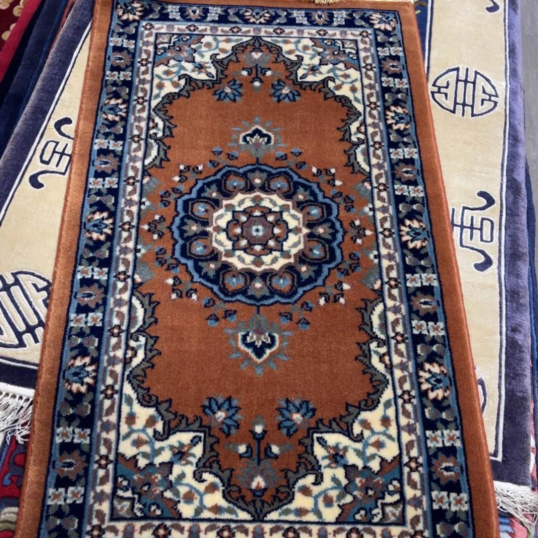 羊毛65×120纯羊毛特价地毯橘色