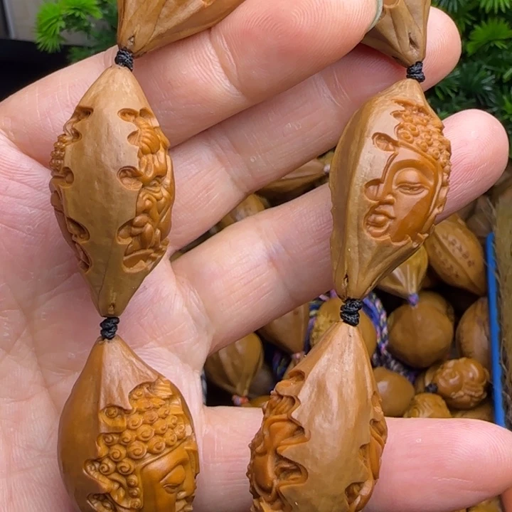 橄榄核雕刻手串一念