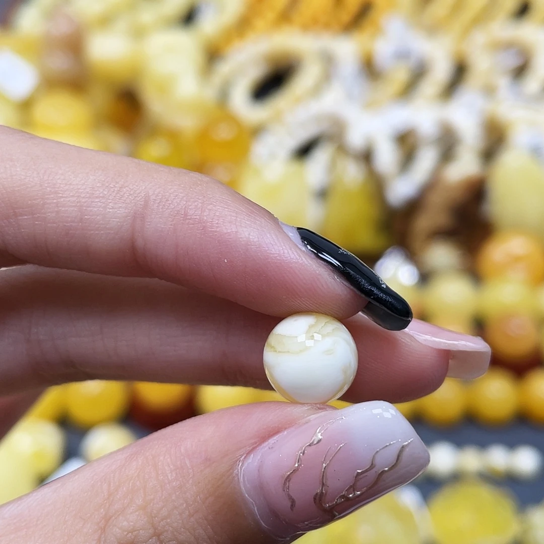 b***e琥珀未镶嵌裸石10.8mm圆珠蜜蜡