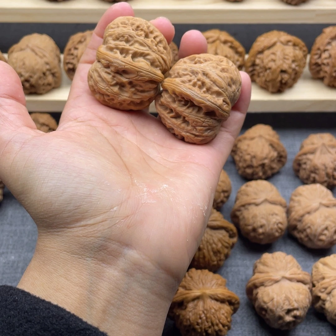 文玩核桃把件元宝微修44