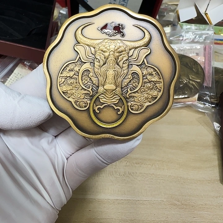 其他普通金属梅花生肖牛铜章一个