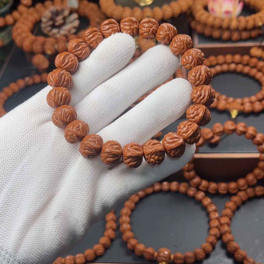 桃核吊坠衣**楚13双脊龙手串