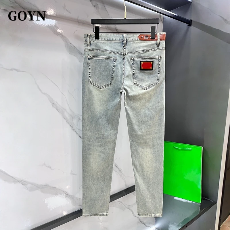 GOYN秋季2025爆款潮流男士弹力修身时尚潮牌浅色简约男装牛仔长裤