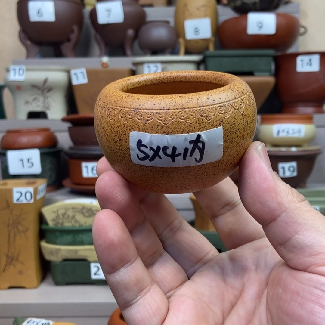 紫砂花盆点击图片看尺寸，标注为内口经尺寸