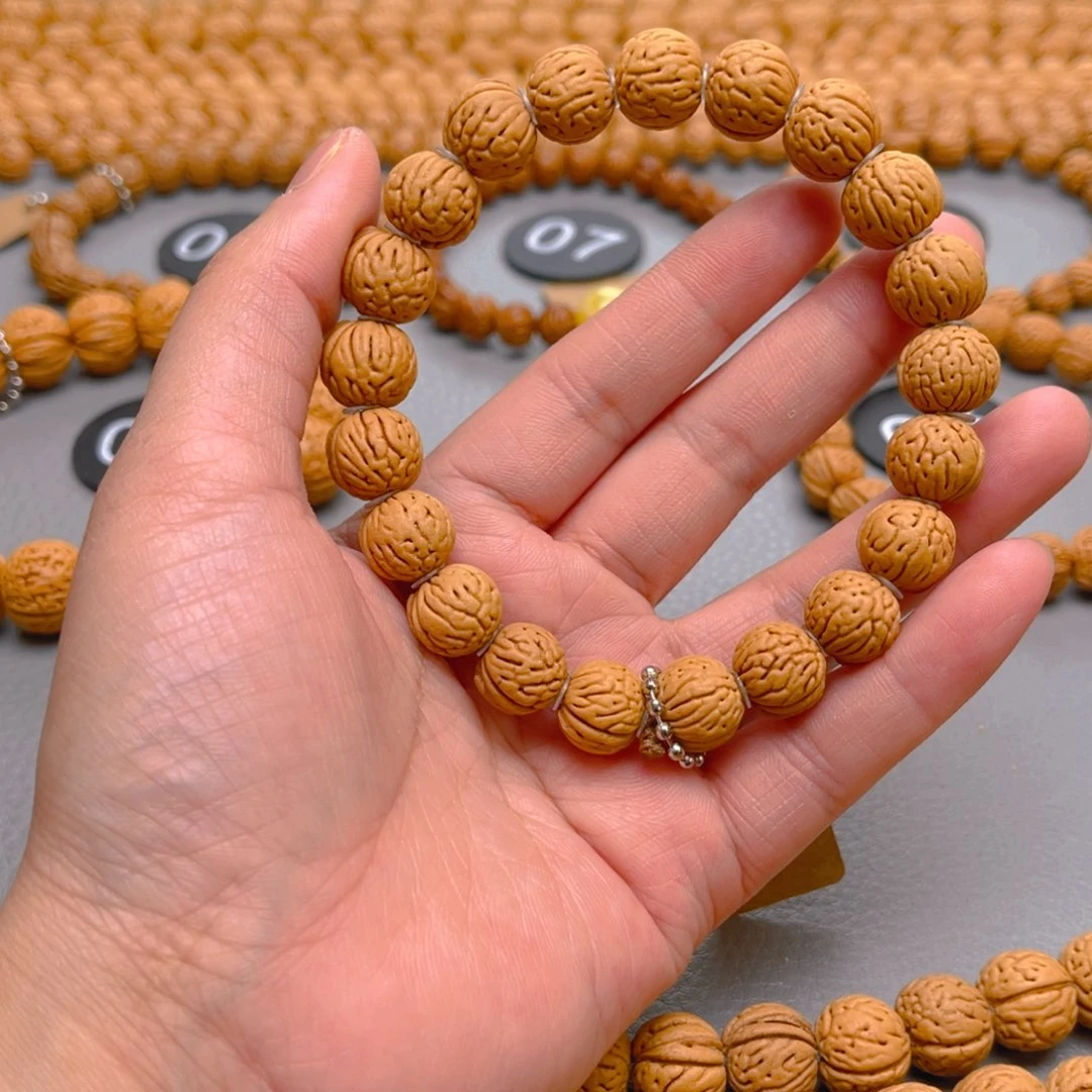 Y***️菩提籽类桃核手串