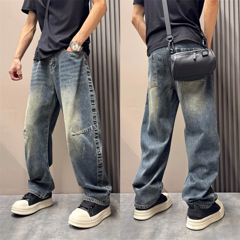 秋季拼接阔腿牛仔长裤美式潮流百搭弯刀裤复古水洗做旧宽松牛仔裤