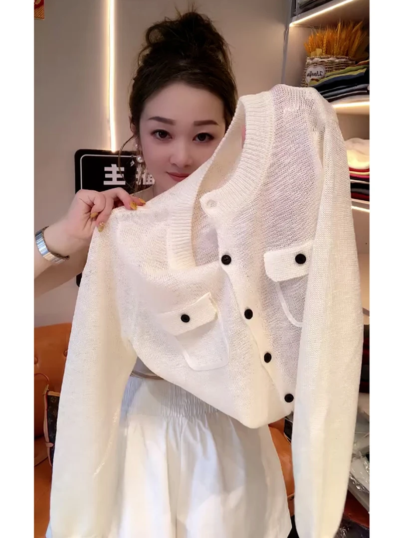 法式高级气质百搭白色上衣女2025夏季薄款防晒圆领长袖针织衫早秋