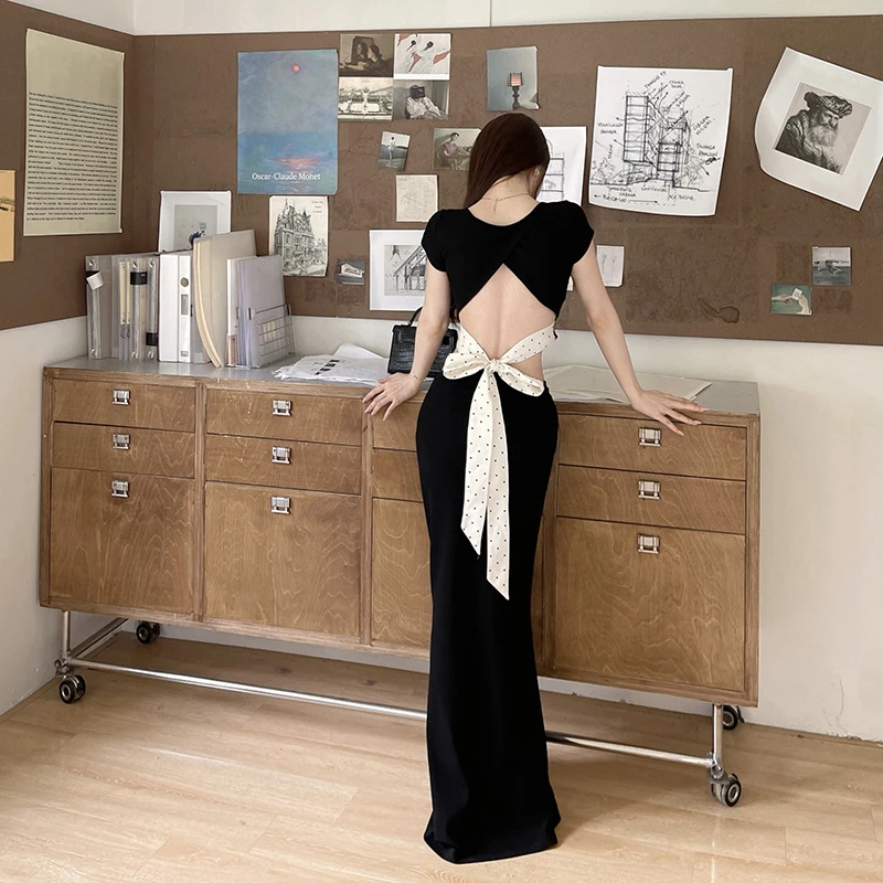 运补6-8 黑色纯欲露背蝴蝶结连衣裙套装女设计感短袖半身裙两件套