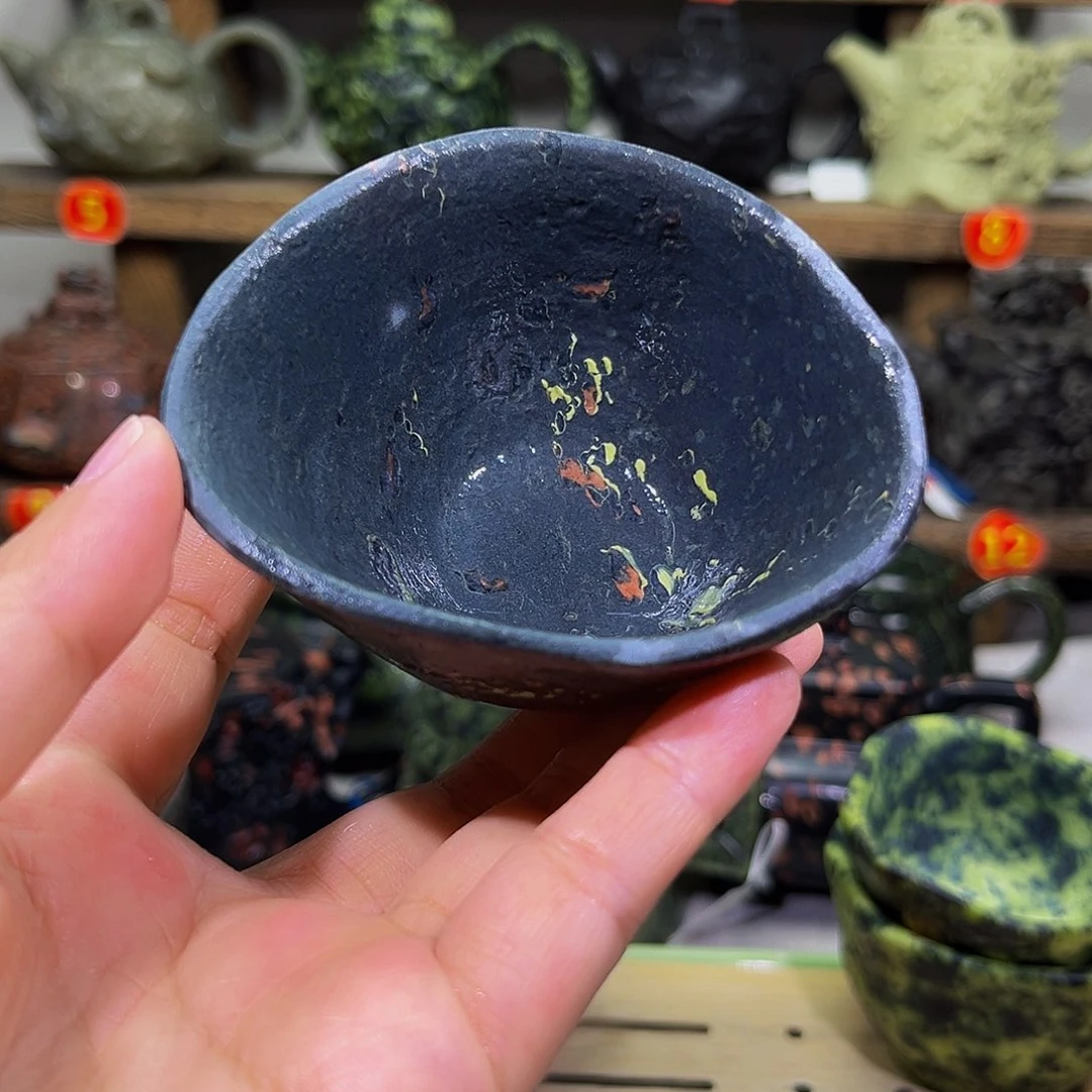 旅****独石材梅花玉安山玉随形杯