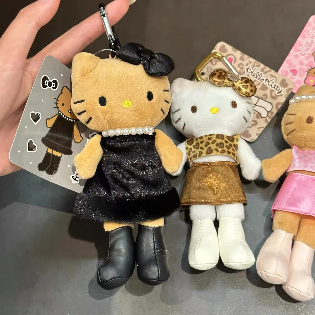 日本三丽鸥豹纹黑皮爱心扣长腿helloKitty毛绒公仔包包挂饰挂件