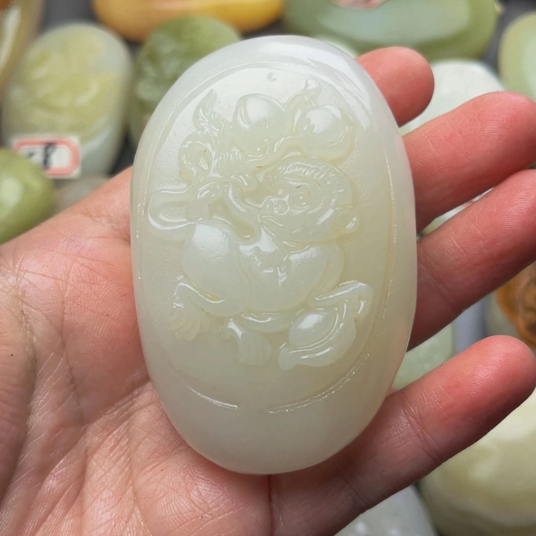 江***傍石材方解石手把件猴