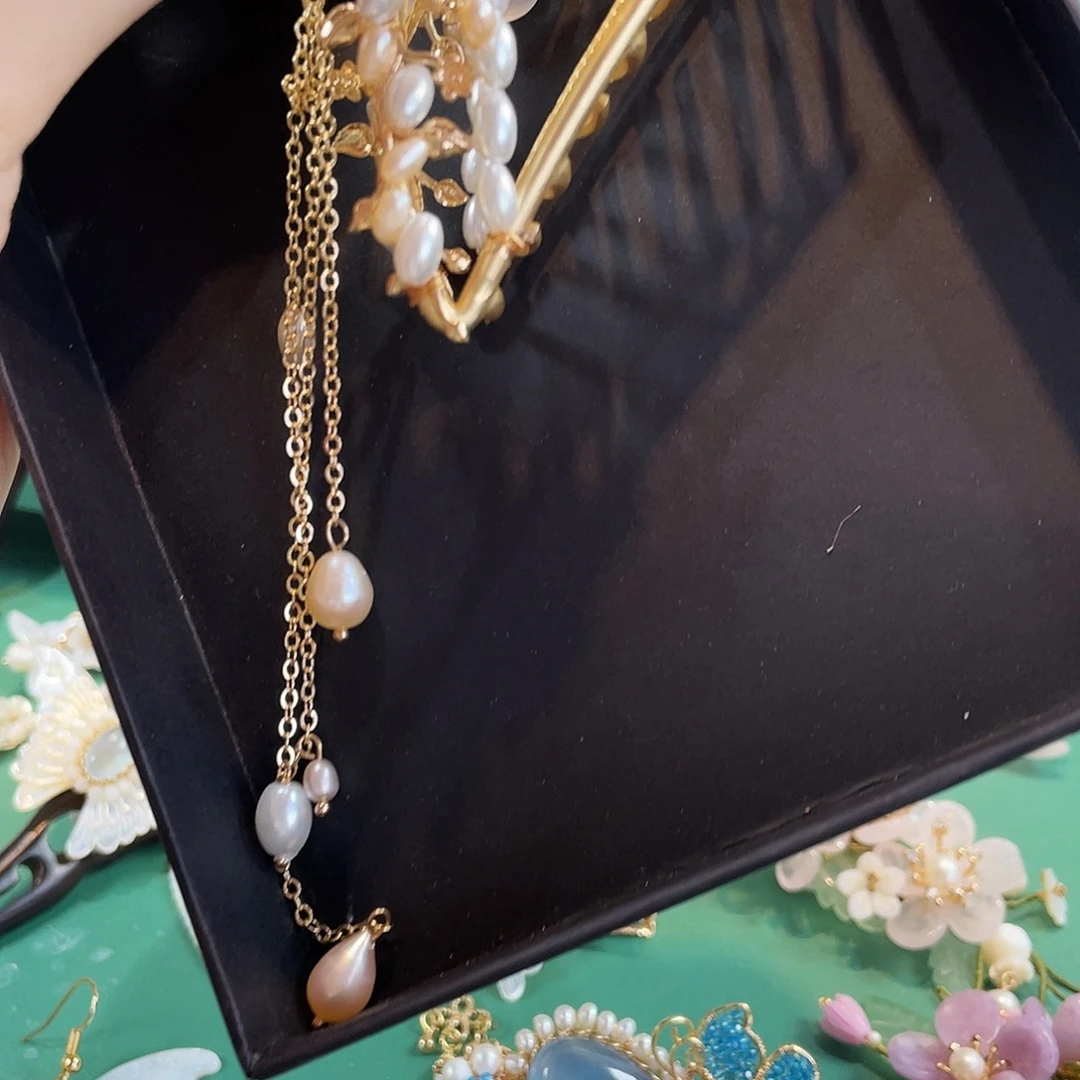 陳***羽合金仿珍珠福利抓夹