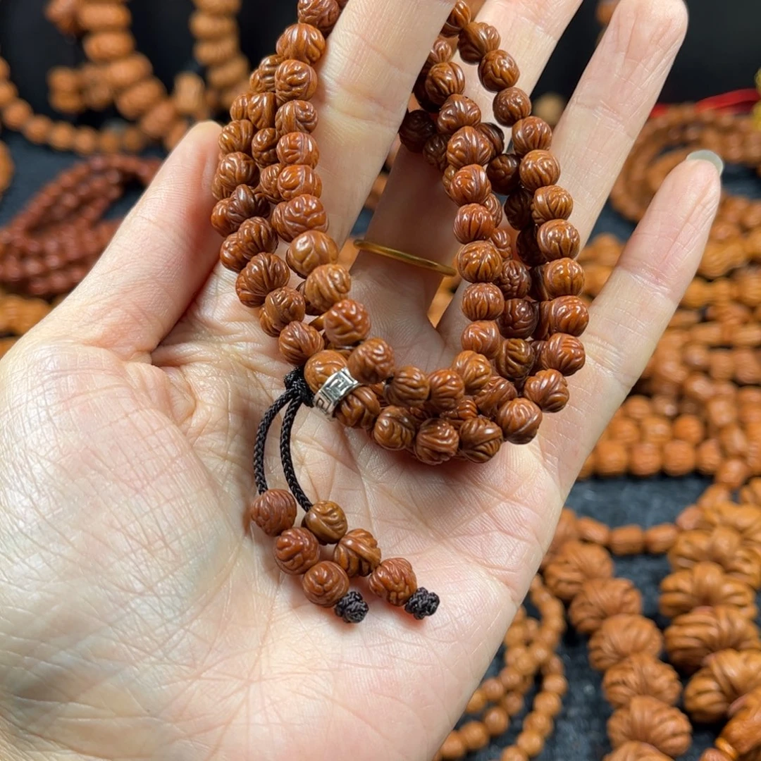 舍****手串桃核C11桃核脖挂108