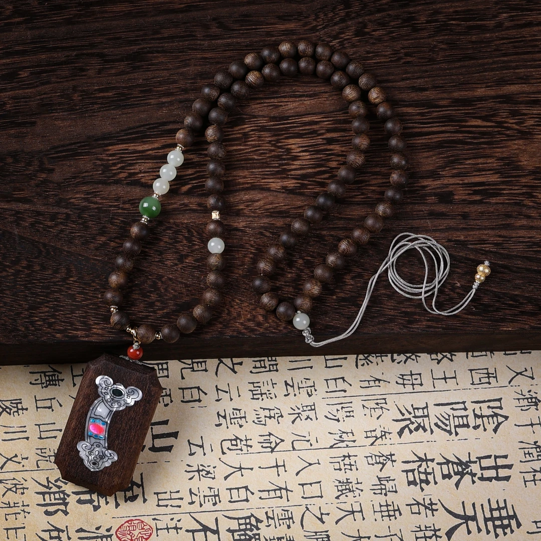 沉香【奇香堂】沉香脖挂-越南芽庄玉化老白棋0.6如意牌设计款脖挂