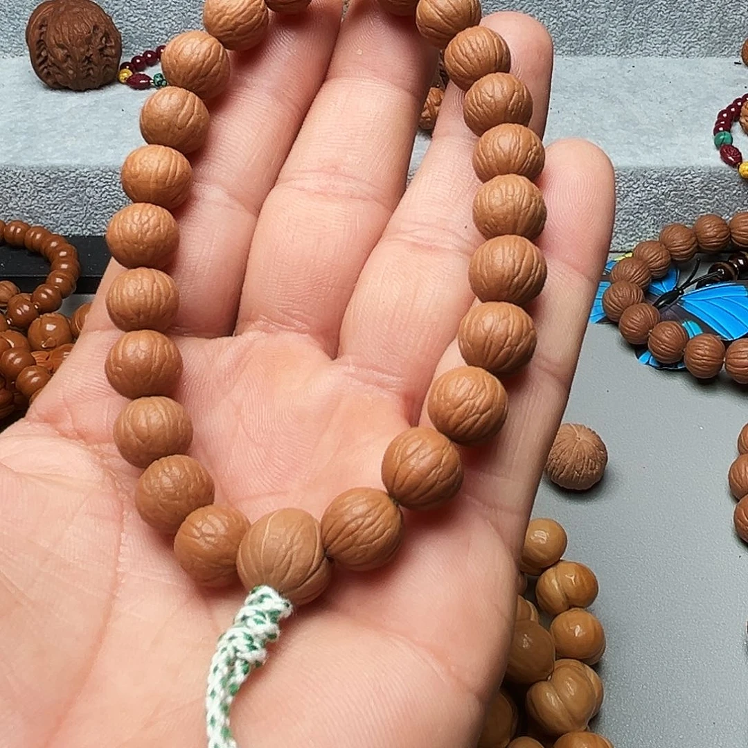 把件猴头核桃_****。凤羽