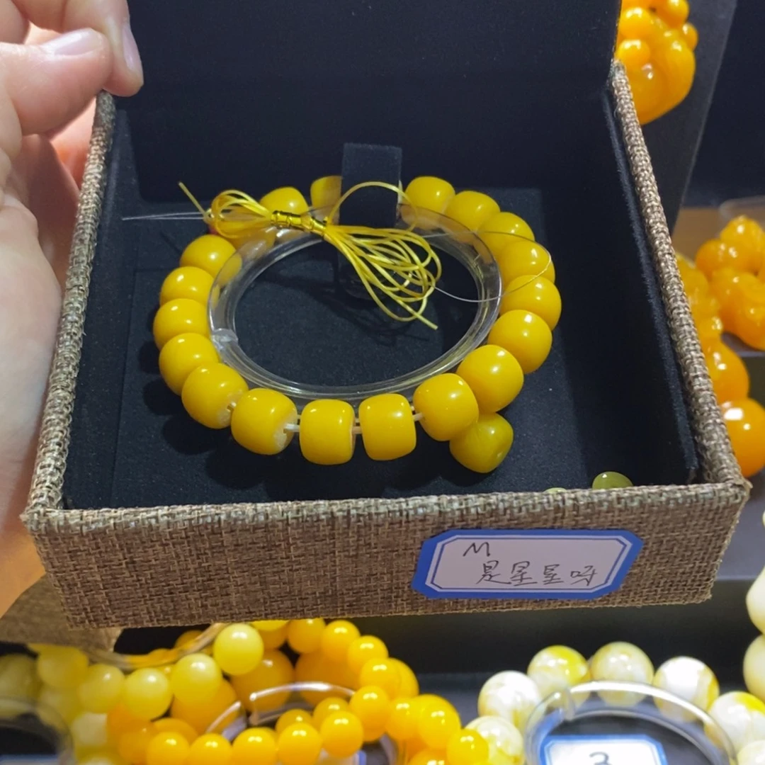 是***、非金属鸡油黄卡12全品手串