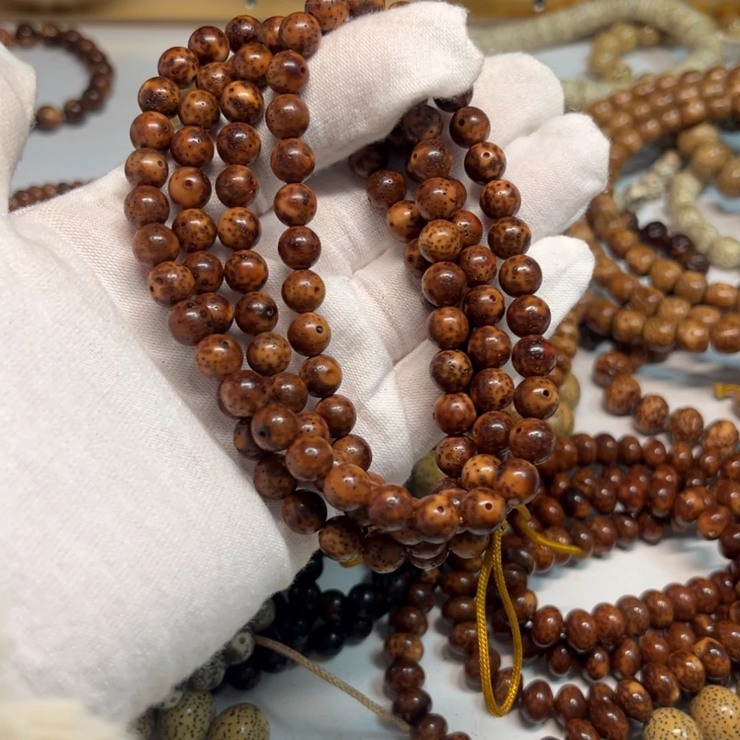 慧***i星月菩提吊坠8正圆珠虎皮