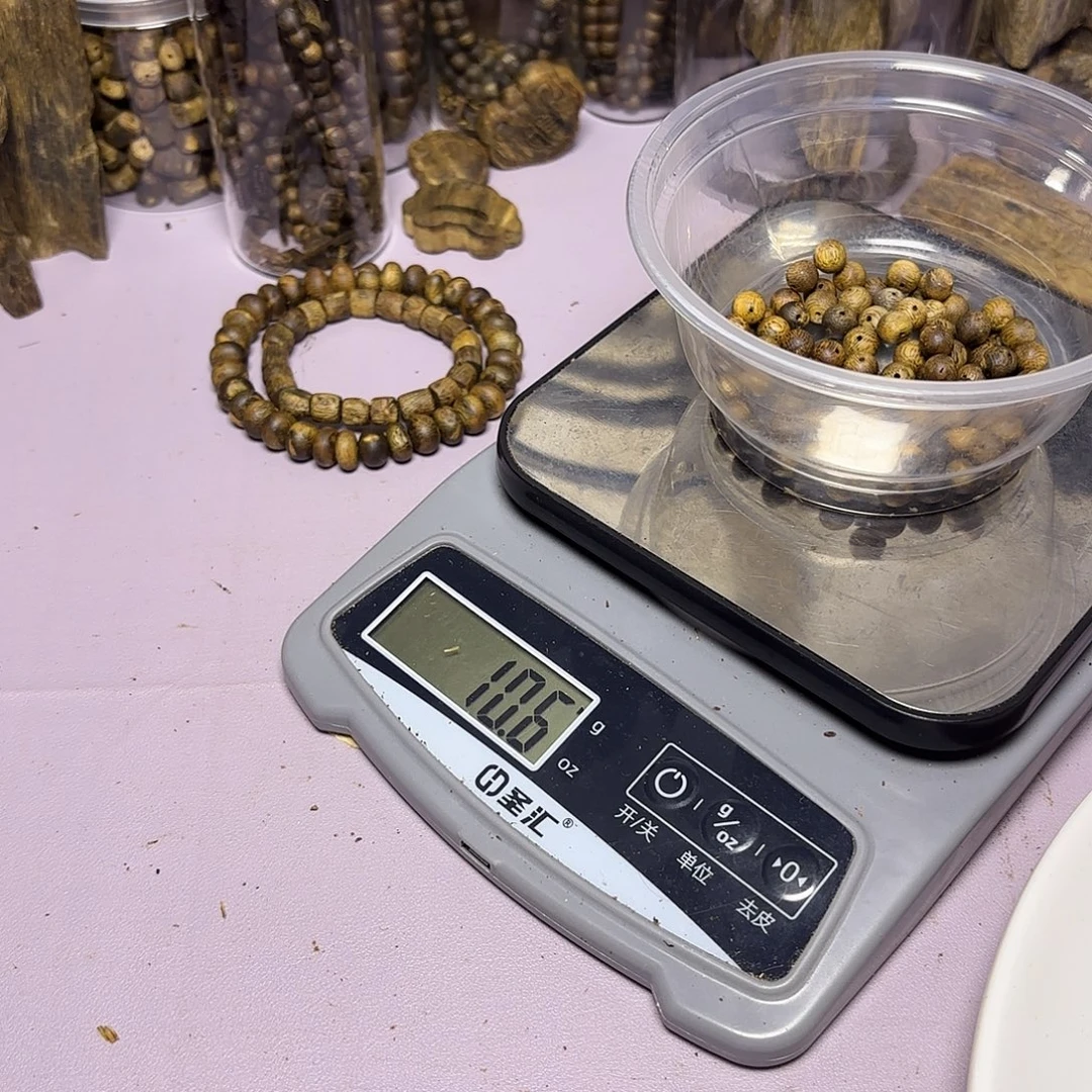 梧***汐木奇楠微瑕散圆珠10克卡7