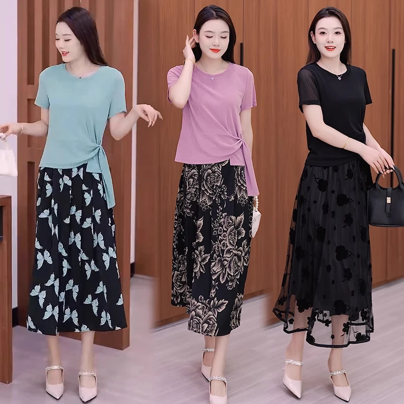 气质连衣裙女2025夏季新款设计感短袖冰丝T恤+印花半身裙两件套装