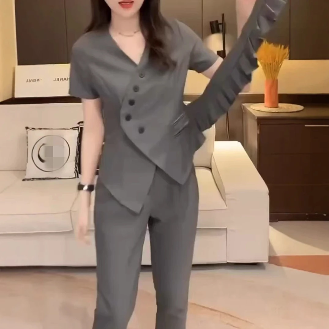 25027时尚气质潮流夏季新款设计感时尚简约V领收腰显瘦两件套女