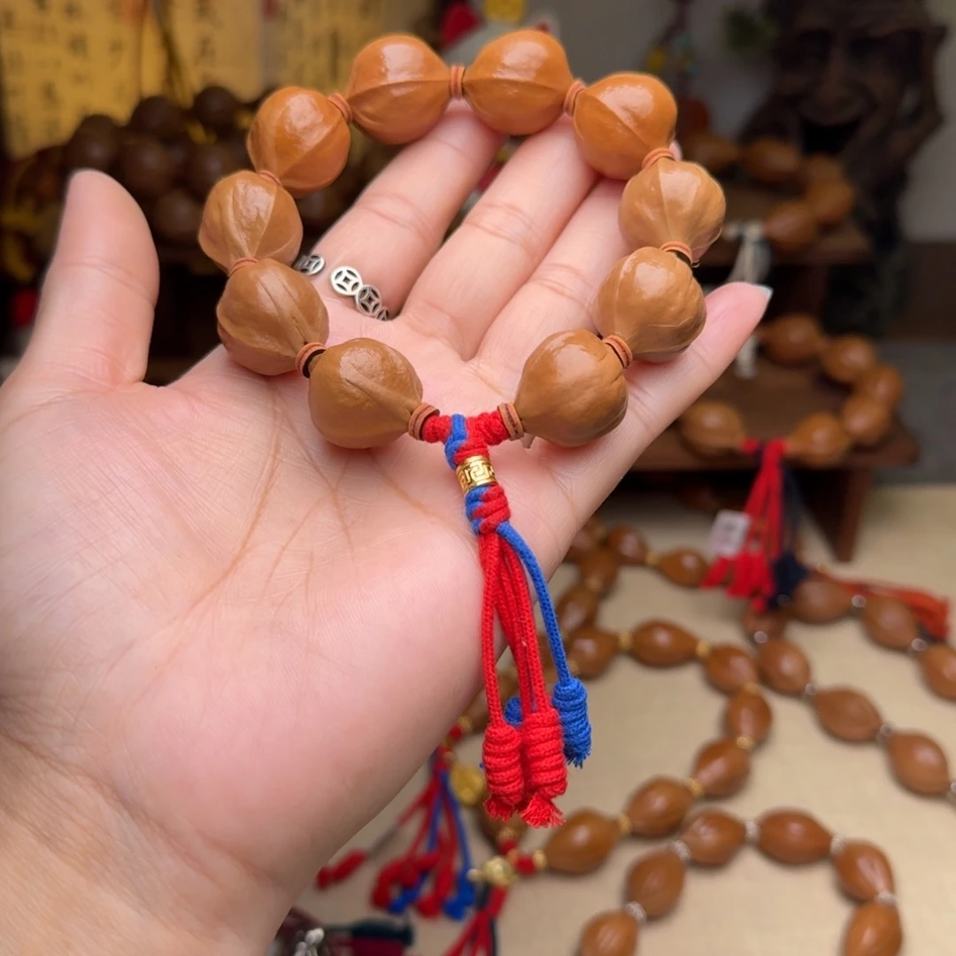 橄榄核手串丹****讯19*23短圆 老树籽正宗梅林铁核