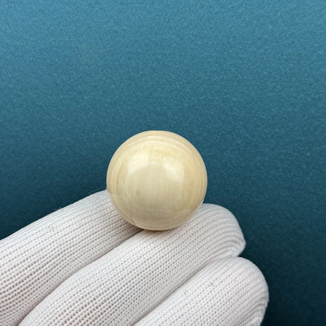 D88-61天然猛犸牙 芝士皮圆珠25mm支持复检假一罚十
