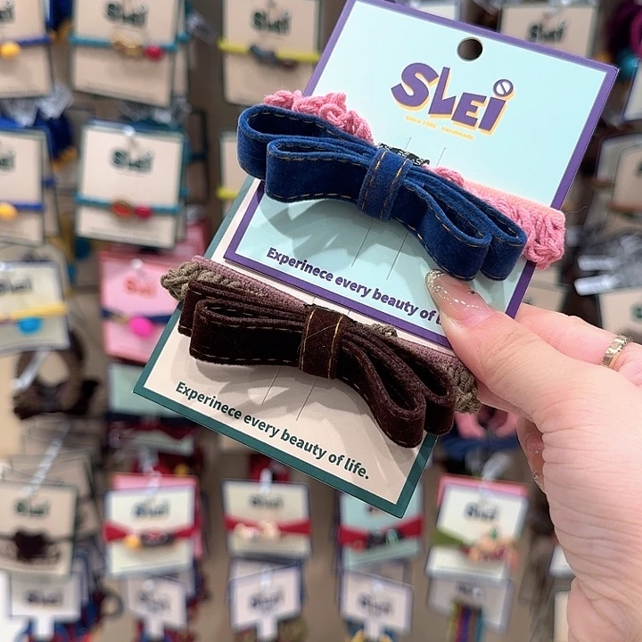 布艺非金属咖色蝴蝶结和蓝粉蝴蝶结各一个