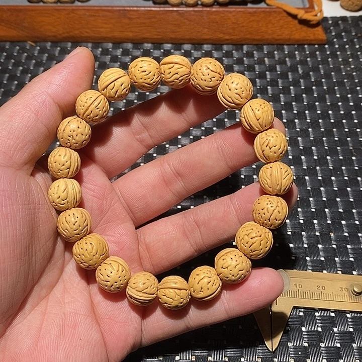 桃核手串顺顺利利48。   54