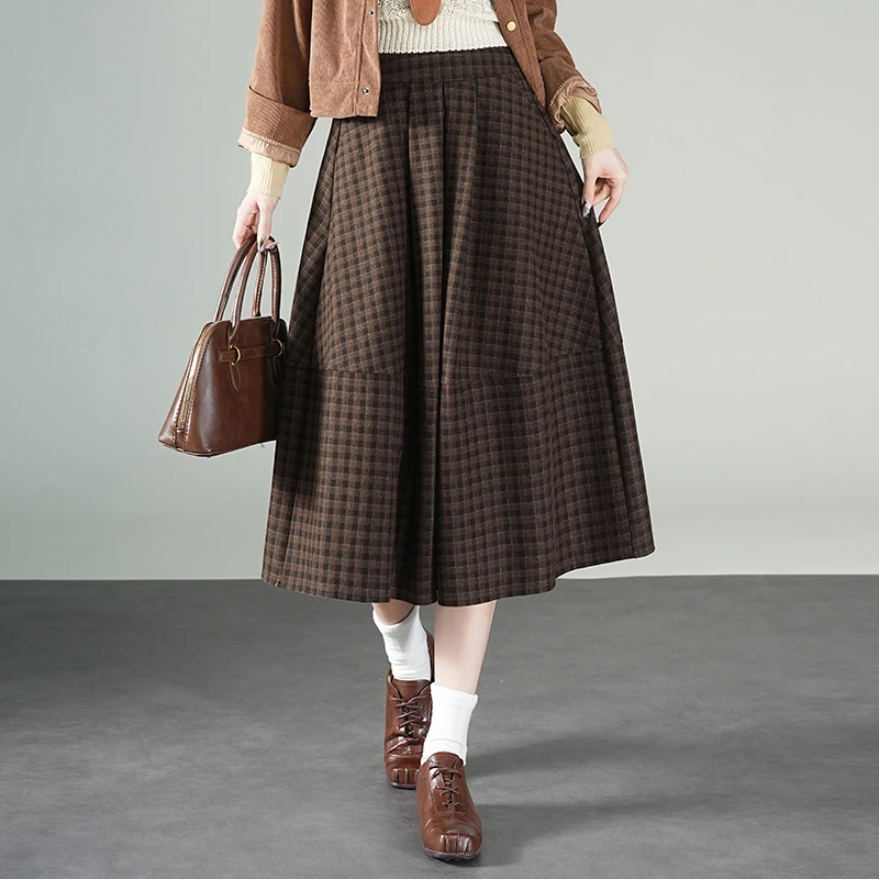 显瘦拼接格子半身裙2025秋季时尚百搭休闲高端出游中长款A字裙潮