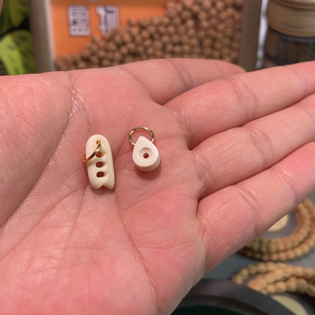 奥***调柏香籽/百香籽吊坠
