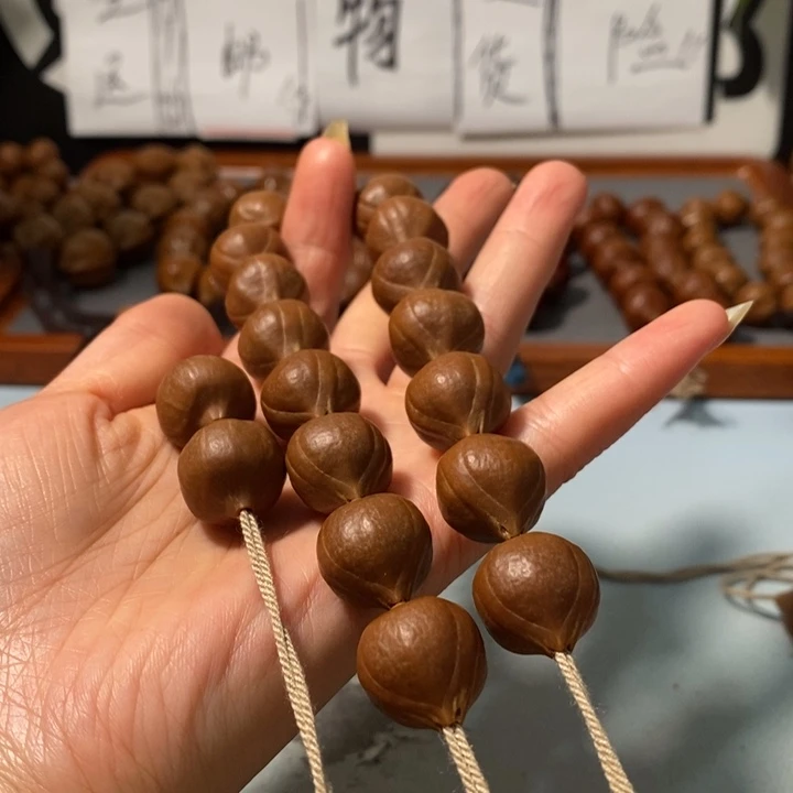 橄榄核手串8161精品蒜头铁核16+2颗