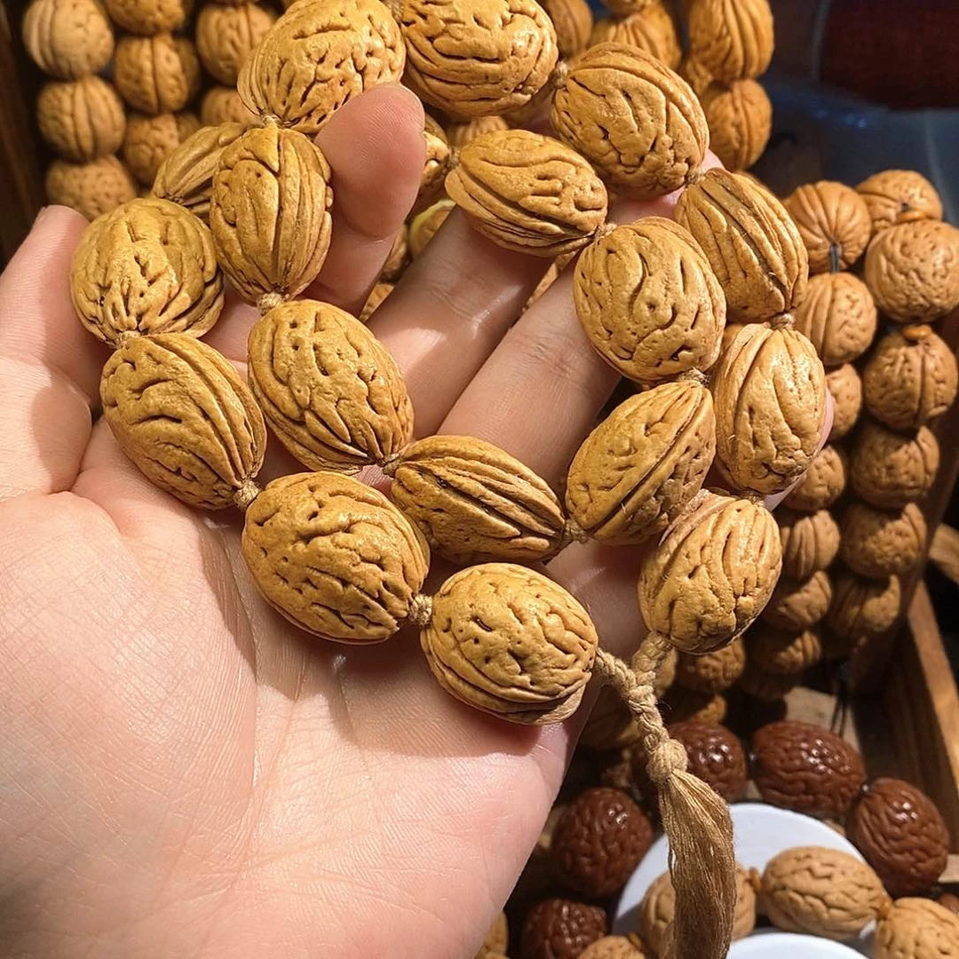 桃核手串有*有钱袋子桃核