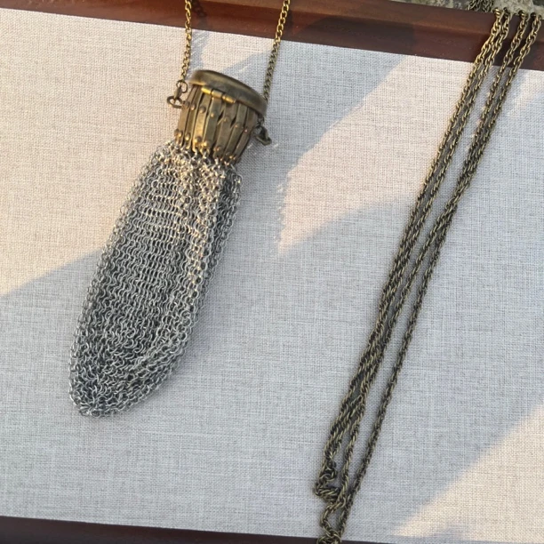 烙哥MEEGHERBE·渔网兜口红包项L链挂脖