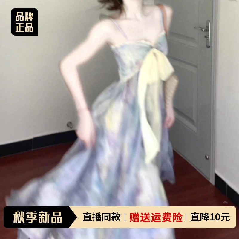 紫色V领吊带连衣裙子女夏2025新款度假风爆款洋气收腰不规则长裙