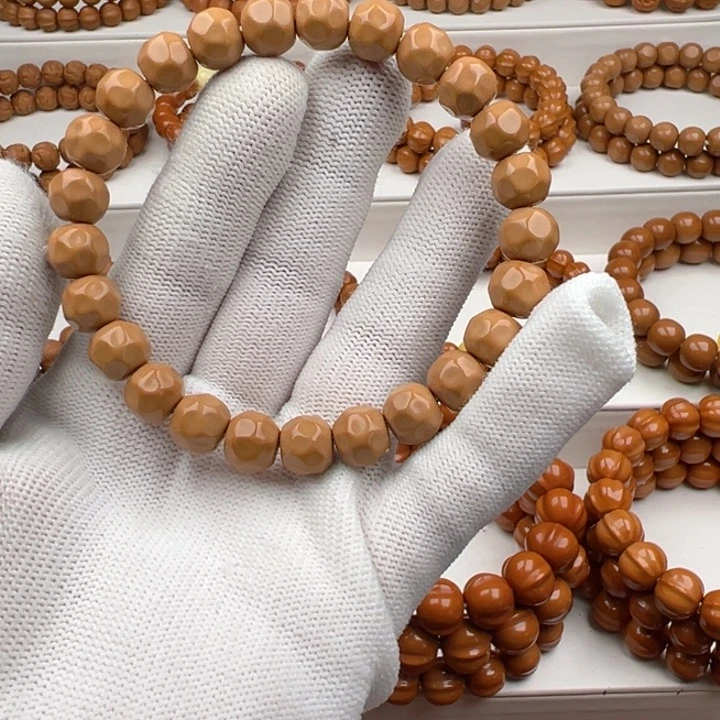 鱼***猴头核桃手串小奶酪